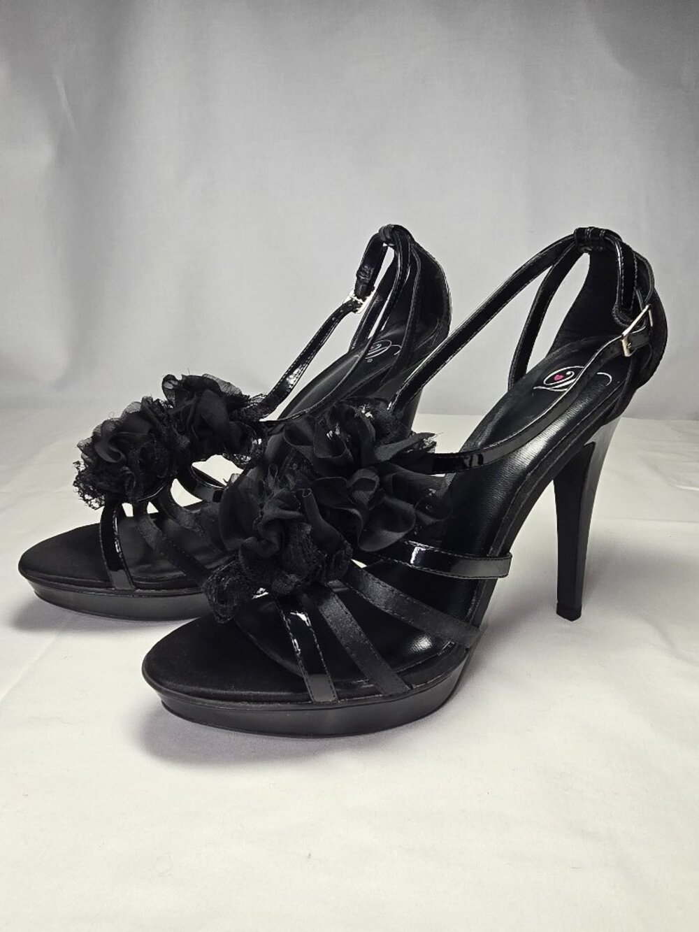 Delicious Black Ruffle Floral Strappy Platform Stiletto Heels – Size 11